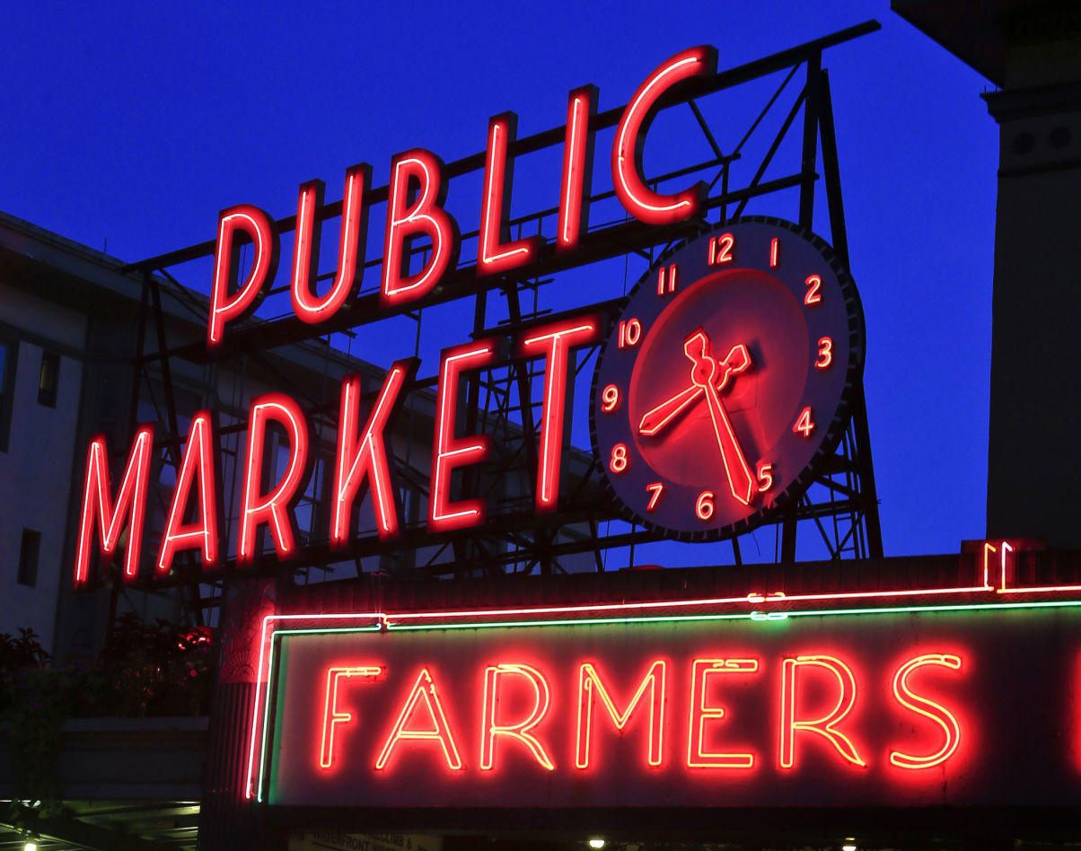 Pike Place Market is the hub of Seattle, where fresh, local produce, seafood, specialty foods and crafts are bought and sold, on Aug. 24, 2014. Open since 1907, the market is a bustling place where live music provides the backdrop to the hundreds of shops and thousands of visitors each day.